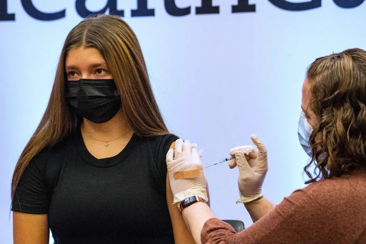 A child receives a shot of Pfizer's COVID-19 vaccine in Hartford, Conn., on Jan. 6, 2022. (Joseph Prezioso/AFP via Getty Images)