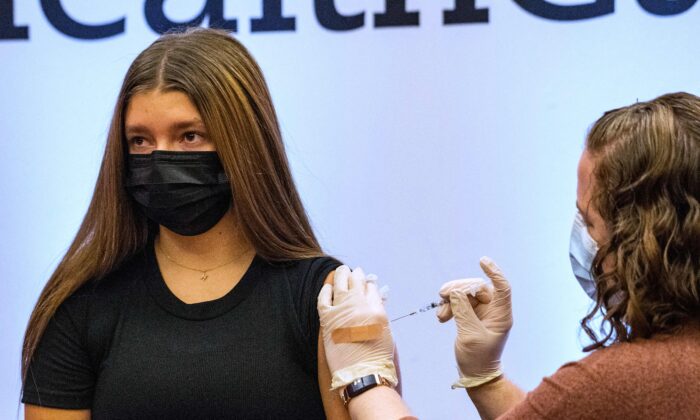 A child receives a shot of Pfizer's COVID-19 vaccine in Hartford, Conn., on Jan. 6, 2022. (Joseph Prezioso/AFP via Getty Images)