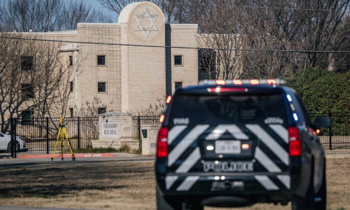 A law enforcement vehicle sits near the Congregation Beth Israel synagogue in Colleyville, Texas, on Jan. 16, 2022. (Brandon Bell/Getty Images)