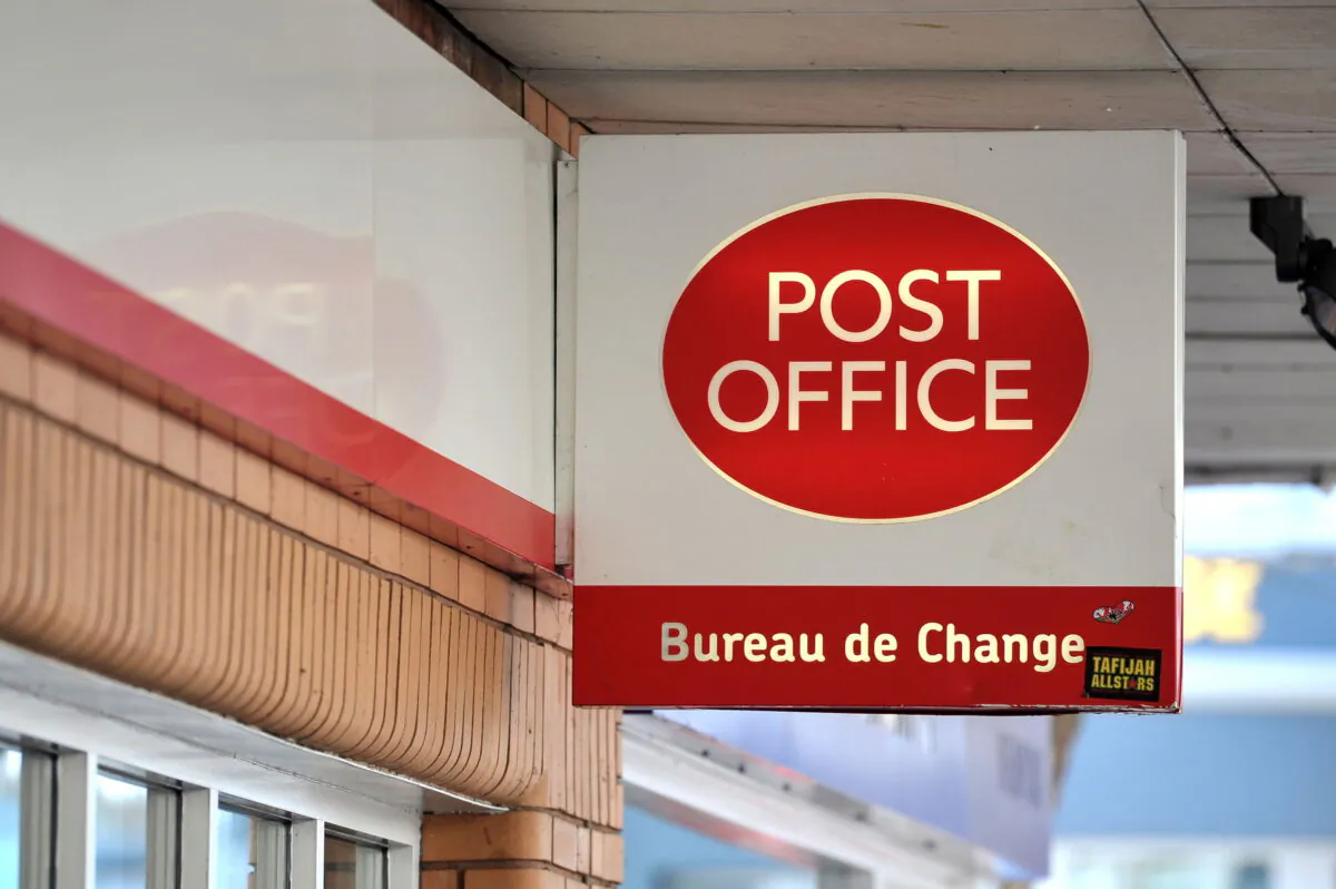 A Post Office sign on May 7, 2013. (Tim Ireland/PA Media)