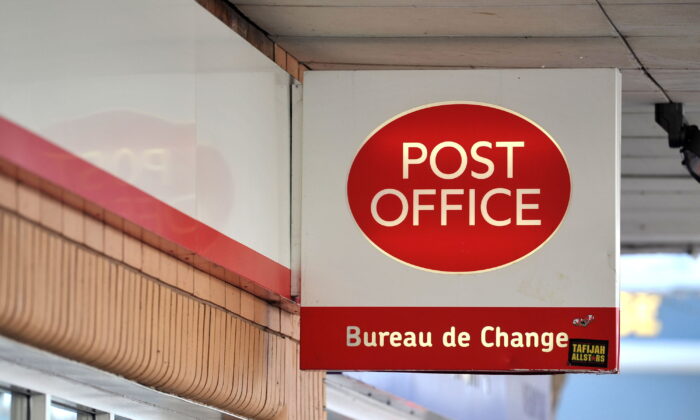A Post Office sign on May 7, 2013. (Tim Ireland/PA Media)
