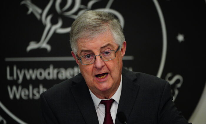 First Minister Mark Drakeford speaks during a Welsh government press conference at the Crown Buildings, Cathay Park in Cardiff, Wales, on Dec. 17, 2021. (Ben Birchall/PA)