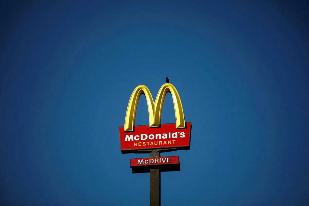 The McDonald's company logo stands on a sign outside a restaurant in Bretigny-sur-Orge, near Paris, France, on July 30, 2020. (Benoit Tessier/Reuters)