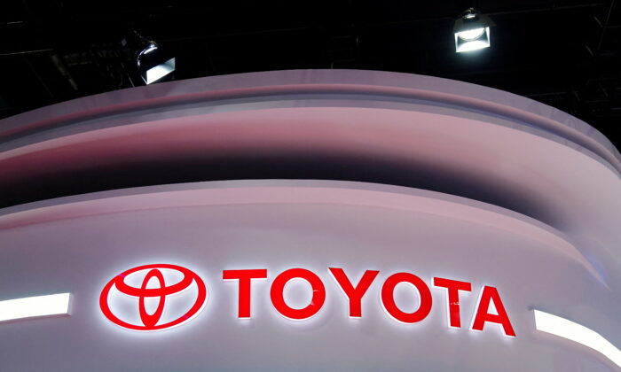 The Toyota logo is seen at its booth during a media day for the Auto Shanghai show in Shanghai, China, on April 19, 2021. (Aly Song/Reuters)