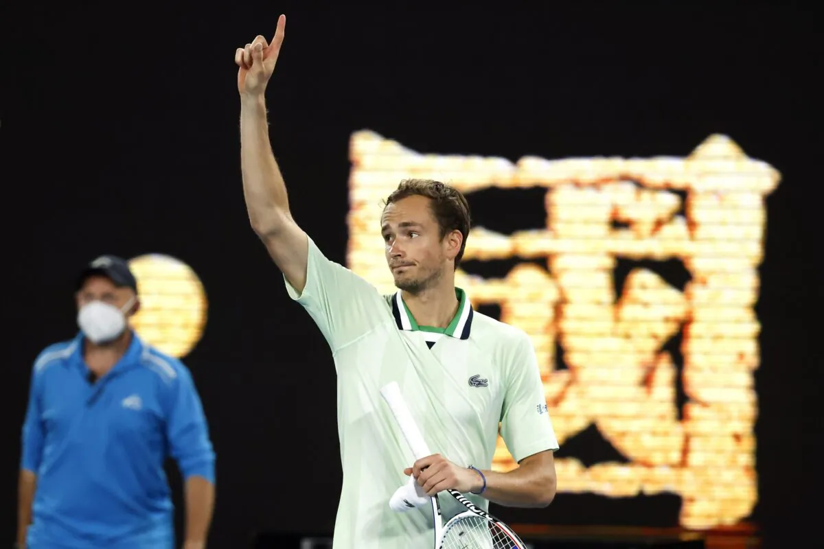 Daniil Medvedev of Russia gestures after defeating Nick Kyrgios of Australia in their second round match at the Australian Open tennis championships in Melbourne, Australia, on Jan. 20, 2022. (Hamish Blair/AP Photo)