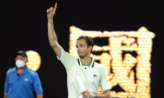 Daniil Medvedev of Russia gestures after defeating Nick Kyrgios of Australia in their second round match at the Australian Open tennis championships in Melbourne, Australia, on Jan. 20, 2022. (Hamish Blair/AP Photo)