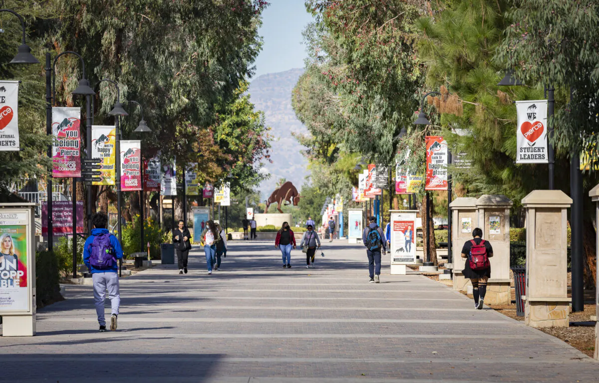 Students at Piece College walk to their classes on Nov. 16, 2021. (John Fredricks/The Epoch Times)