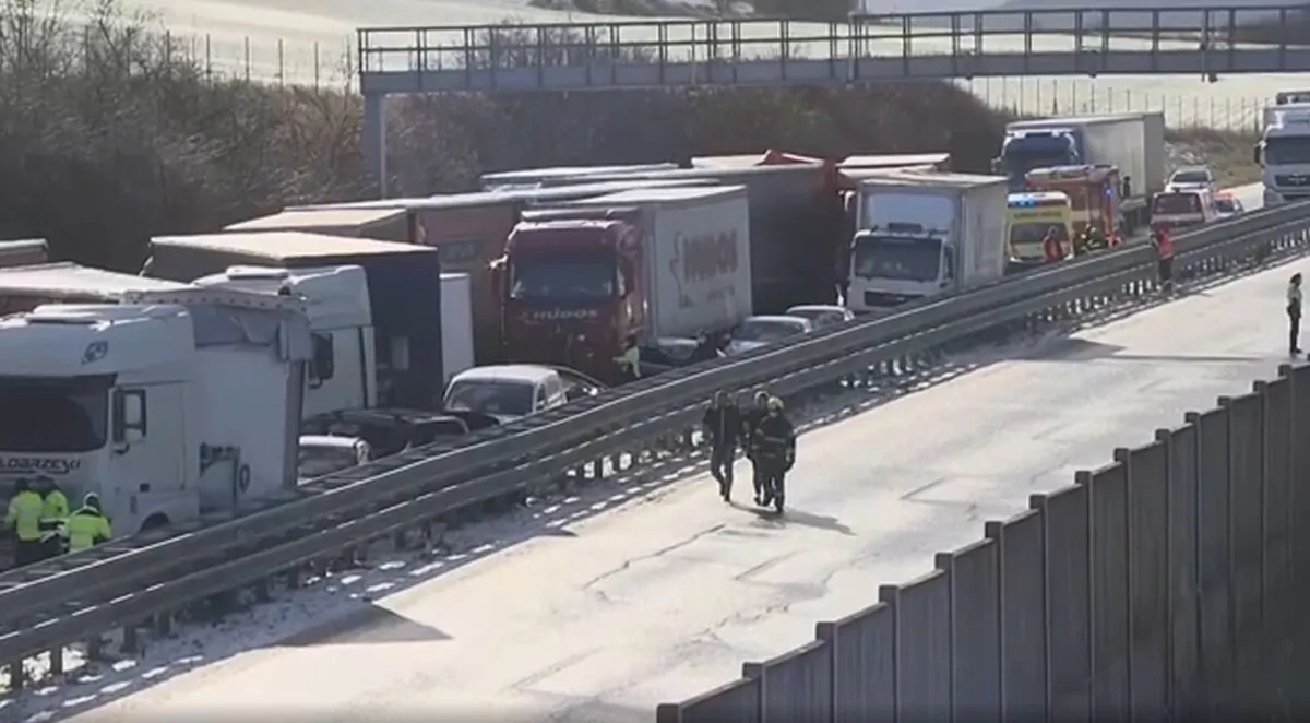 Trucks and cars involved in a multi-car crash on highway D5 near Zebrak in Beroun Region, Czech Republic, on Jan. 20, 2022. (AP/Screenshot via The Epoch Times)
