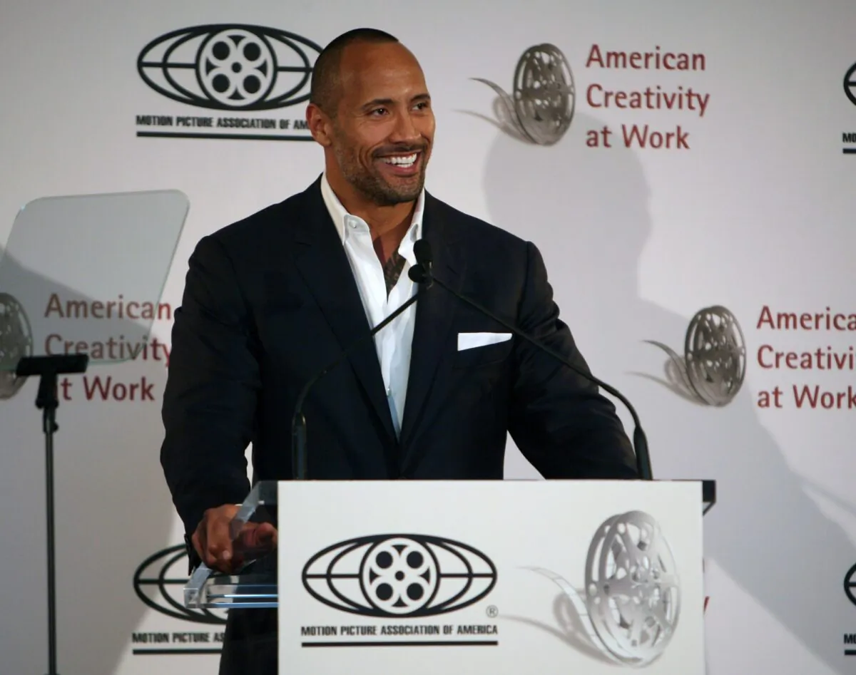 Dwayne Johnson delivers keynote remarks during The Motion Picture Association of America's "Business of Show Business" symposium at the Hotel Monaco in Washington, on April 21, 2009. (Abby Brack/Getty Images)