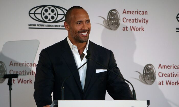 Dwayne Johnson delivers keynote remarks during The Motion Picture Association of America's "Business of Show Business" symposium at the Hotel Monaco in Washington, on April 21, 2009. (Abby Brack/Getty Images)