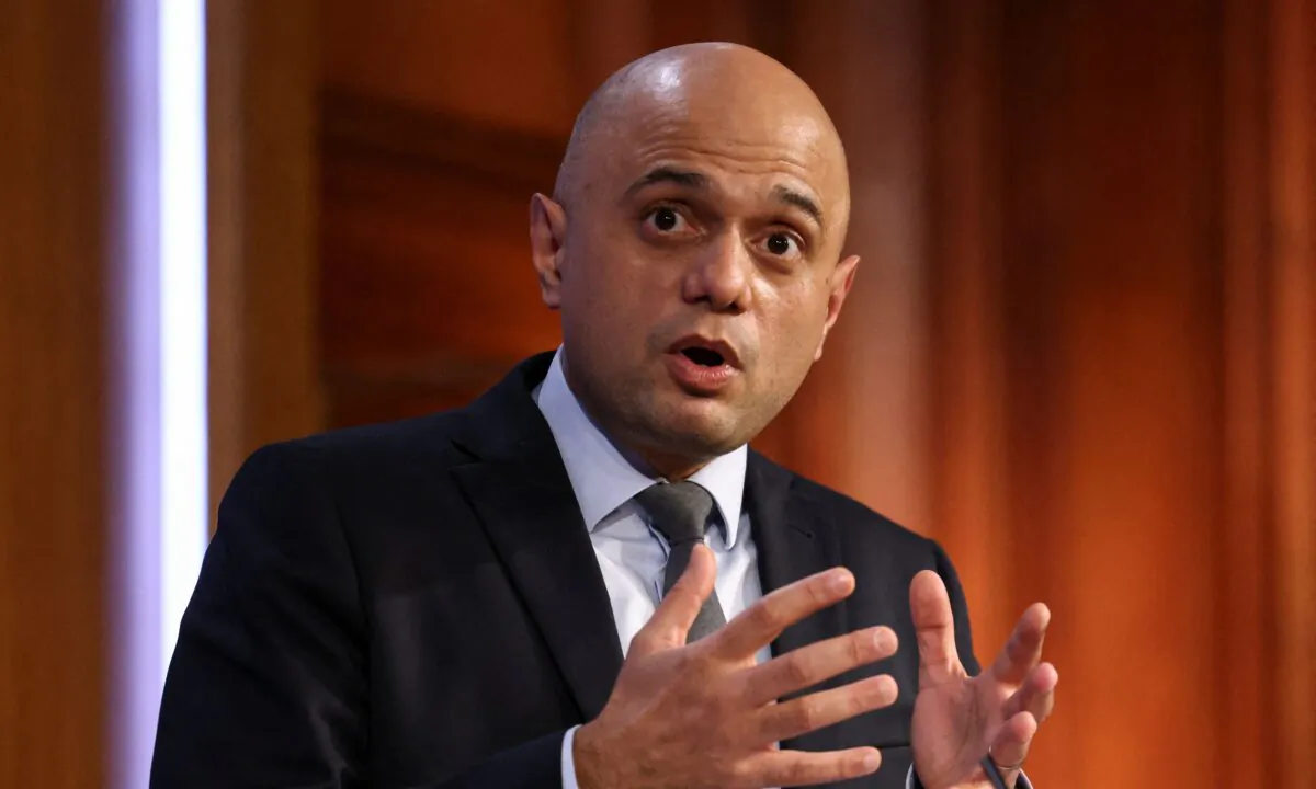 Britain's Health Secretary Sajid Javid speaks during a press conference to update the nation on the COVID-19 pandemic, inside the Downing Street Briefing Room in central London on Jan. 19, 2022. (Henry Nicholls/POOL/AFP via Getty Images)