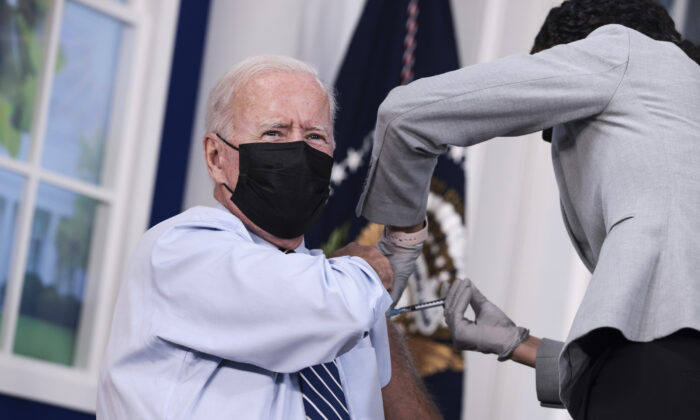 President Joe Biden receives a third dose of the Pfizer/BioNTech COVID-19 vaccine in the South Court Auditorium in the White House on Sept. 27, 2021. (Anna Moneymaker/Getty Images)