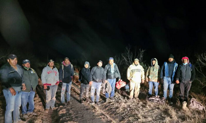 A group of illegal aliens is apprehended by law enforcement on a ranch in Kinney County, Texas, on Jan. 14, 2022. (Courtesy of Kinney County Sheriff's Office)