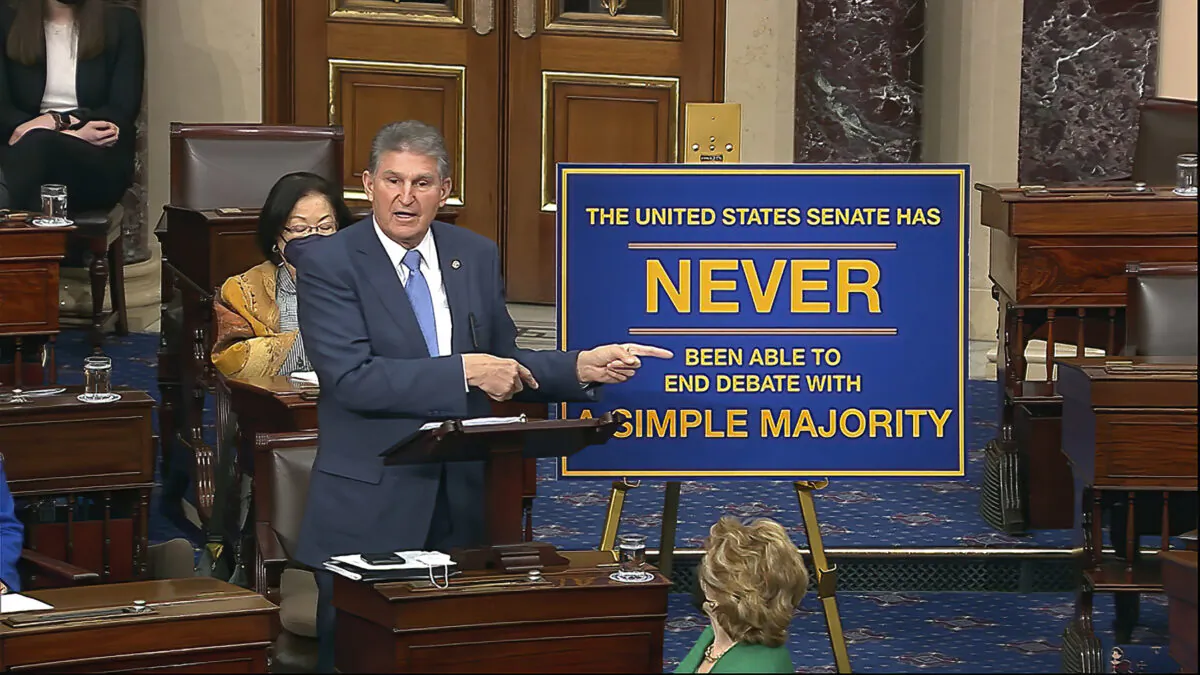 Sen. Joe Manchin (D-W.Va.) speaks on the floor of the U.S. Senate at the U.S. Capitol in Washington on Jan. 19, 2022. (Senate Television via AP)
