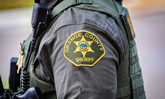 An Orange County sheriff's deputy is seen in Yorba Linda, Calif., on Oct. 4, 2021. (John Fredricks/The Epoch Times)