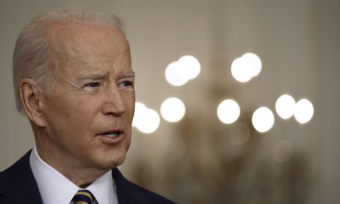 President Joe Biden talks to reporters during a news conference at the White House in Washington on Jan. 19, 2022. (Chip Somodevilla/Getty Images)
