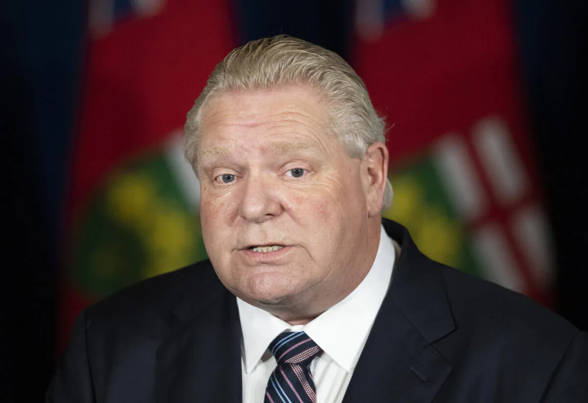 Ontario Premier Doug Ford holds a press conference at Queen’s Park regarding the easing of restrictions during the COVID-19 pandemic in Toronto on Jan. 20, 2022. (The Canadian Press/Nathan Denette)