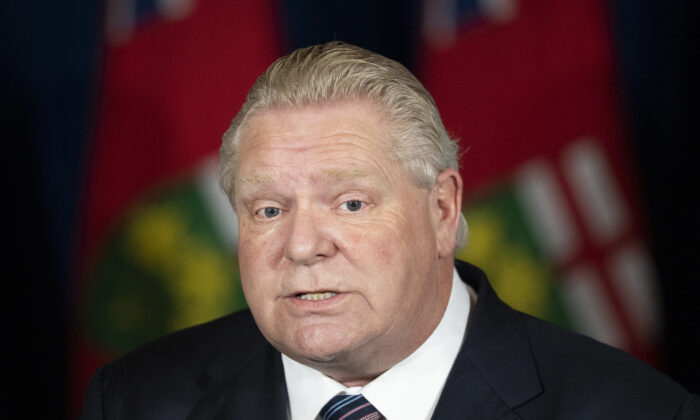 Ontario Premier Doug Ford holds a press conference at Queen’s Park regarding the easing of restrictions during the COVID-19 pandemic in Toronto on Jan. 20, 2022. (The Canadian Press/Nathan Denette)