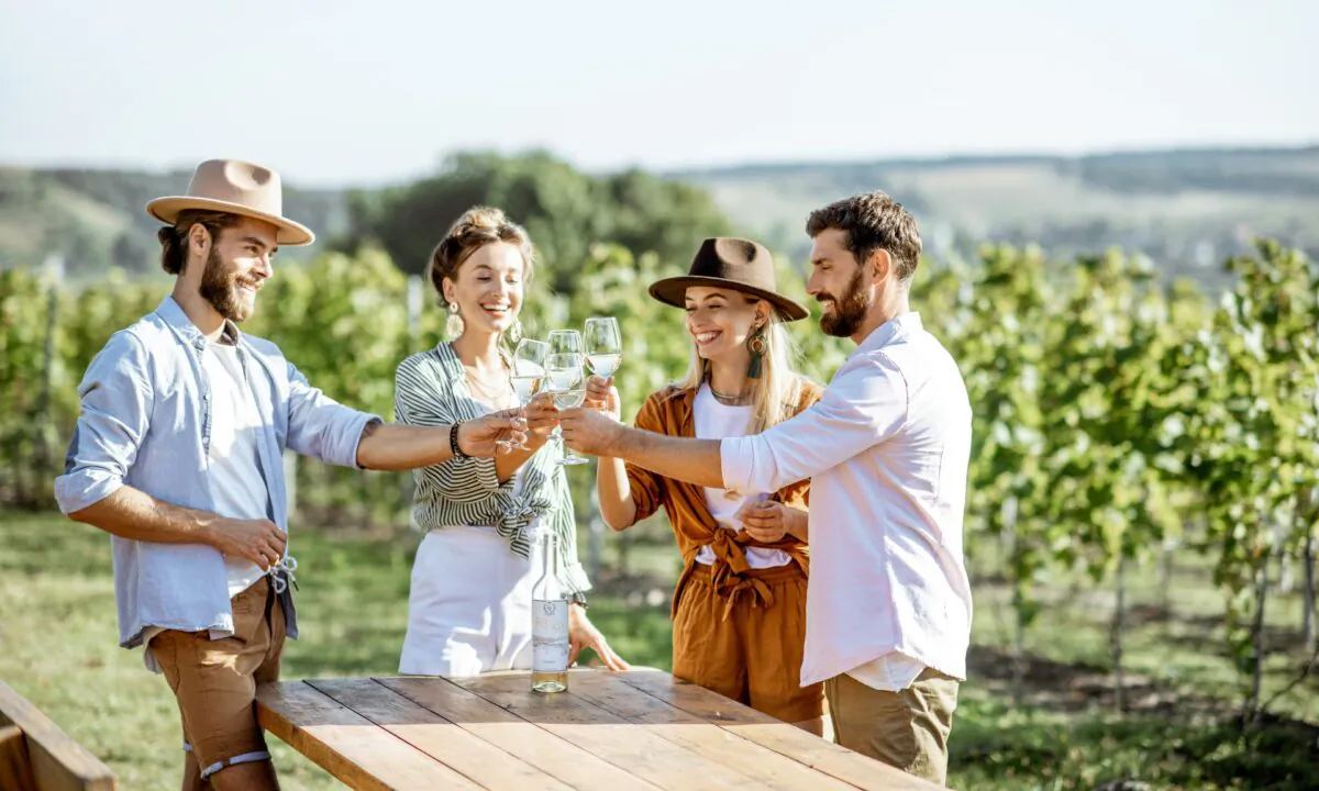 Enjoy wine with others such as a group of friends or a local wine enthusiast group. (RossHelen/shutterstock)