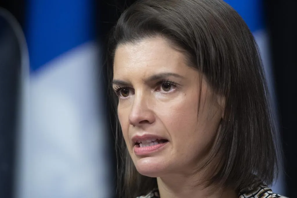 Quebec Deputy premier and Public Security Minister Genevieve Guilbault responds to reporters questions the tabling of a legislation on public security, Dec. 8, 2021 at the legislature in Quebec City. (The Canadian Press/Jacques Boissinot)