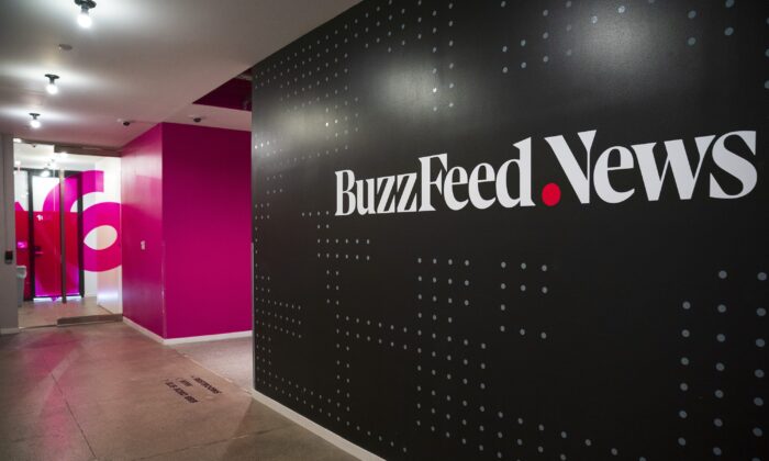 A BuzzFeed News logo adorns a wall inside BuzzFeed headquarters in New York, on Dec. 11, 2018. (Drew Angerer/Getty Images)