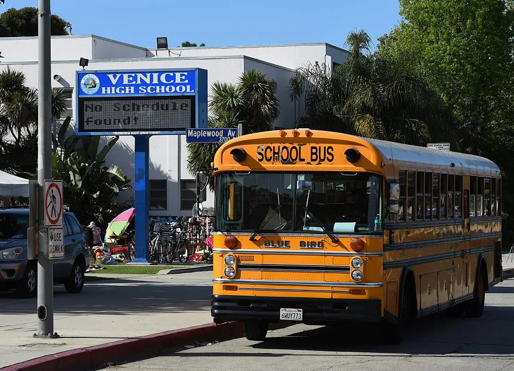 A school bus is parked outside the Venice High School in Venice Beach, Calif., on March 14, 2015. (Mark Ralston/AFP via Getty Images)