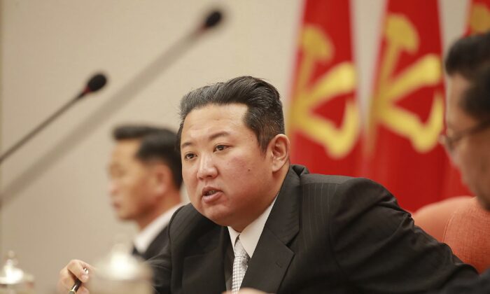 North Korean leader Kim Jong Un (C) attends a meeting of the Central Committee of the ruling Workers' Party in Pyongyang, North Korea, in a photo taken during Dec. 27–Dec. 31, 2021. (Korean Central News Agency/Korea News Service via AP, File)