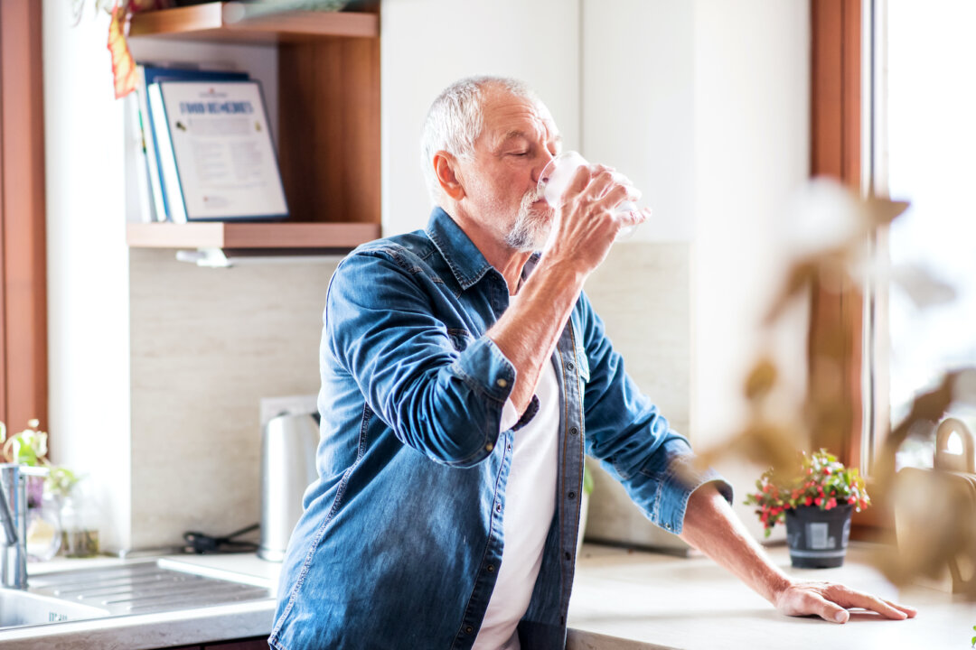 Japanese experts have found through observation and research that 70 percent of the symptoms of dementia are expected to disappear through adequate water intake. (Halfpoint/Shutterstock)