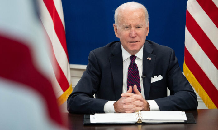 President Joe Biden meets with advisers in Washington on Jan. 20, 2022. (Saul Loeb/AFP via Getty Images)