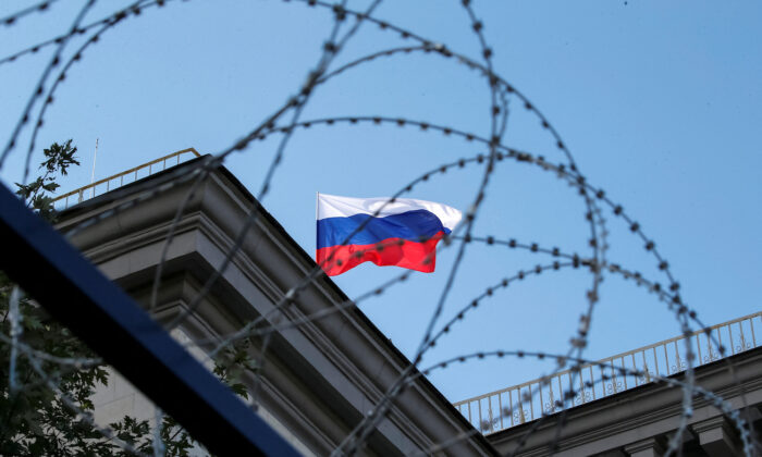 A Russian national flag is seen at the roof of the Russian embassy in Kiev, Ukraine, on Sept. 18, 2016. (Gleb Garanich/Reuters)