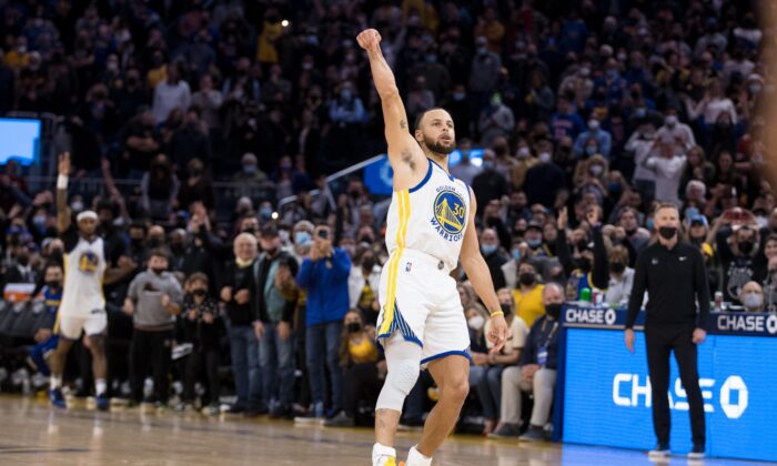 Golden State Warriors guard Stephen Curry (30) celebrates after making the game-winning shot in the last seconds of the second half of the game against the Houston Rockets at Chase Center. (John Hefti/USA TODAY Sports via Field Level Media)