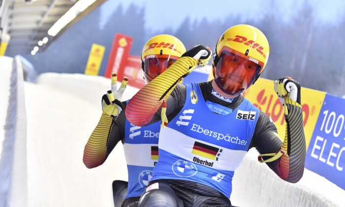 Toni Eggert (R) and Sascha Benecken from Germany at the Luge World Cup in Oberhof, Germany, on Jan. 16, 2022. (Martin Schutt/dpa via AP)