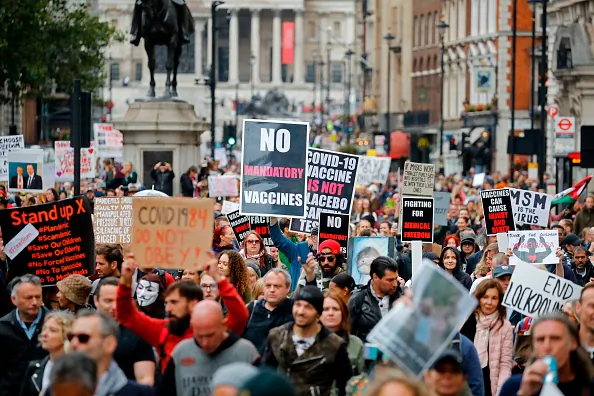 Protesters march down Whitehall in central London to "expose the truth about Covid and lockdown" at a demonstration organised by Save our Rights on Aug. 29, 2020. (Tolga Akmen/AFP via Getty Images)