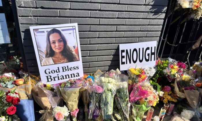 Dozens of friends, co-workers, and Hancock Park residents held a vigil for Brianna Kupfer, a 24-year-old UCLA graduate student, outside of a furniture store in Los Angeles, on Jan. 20, 2022. She was fatally stabbed on Jan. 13, 2022, in the furniture store, where she was working. (The Epoch Times)