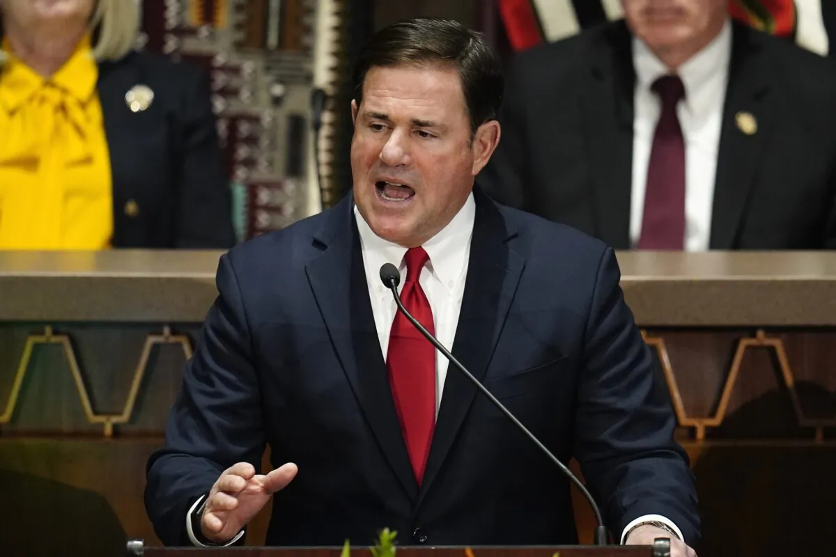 Arizona Republican Gov. Doug Ducey gives his state of the state address at the Arizona Capitol on Monday, Jan. 10, 2022. (Ross D. Franklin/AP Photo).