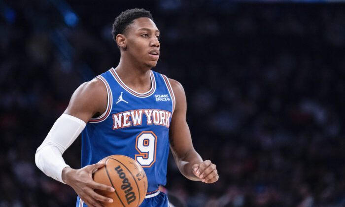 New York Knicks guard RJ Barrett (9) dribbles the ball up the court during the first half of an NBA basketball game against the Los Angeles Clippers in New York on Jan. 23, 2022. (John Minchillo/AP Photo)