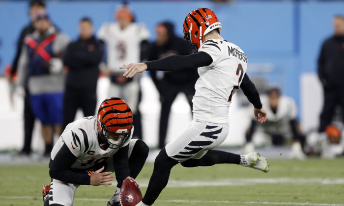 Kicker Evan McPherson #2 of the Cincinnati Bengals hits the game winning field goal against the Tennessee Titans in the AFC Divisional Playoff game at Nissan Stadium, in Nashville, on Jan. 22, 2022. (Wesley Hitt/Getty Images)