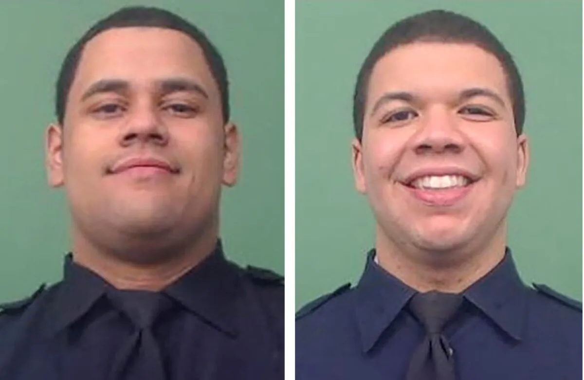 NYPD Officers Wilbert Mora (L) and Jason Rivera. (Courtesy of NYPD via AP)