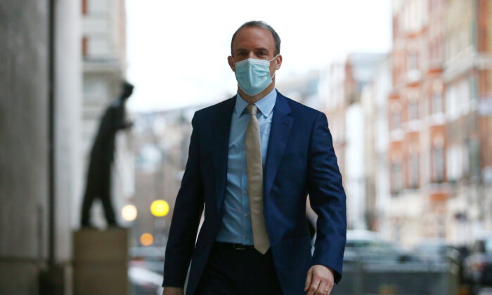 Deputy Prime Minister Dominic Raab arrives at BBC Broadcasting House ahead of his appearance on "Sunday Morning," in London, on Jan. 23, 2022. (Hollie Adams/Getty Images)