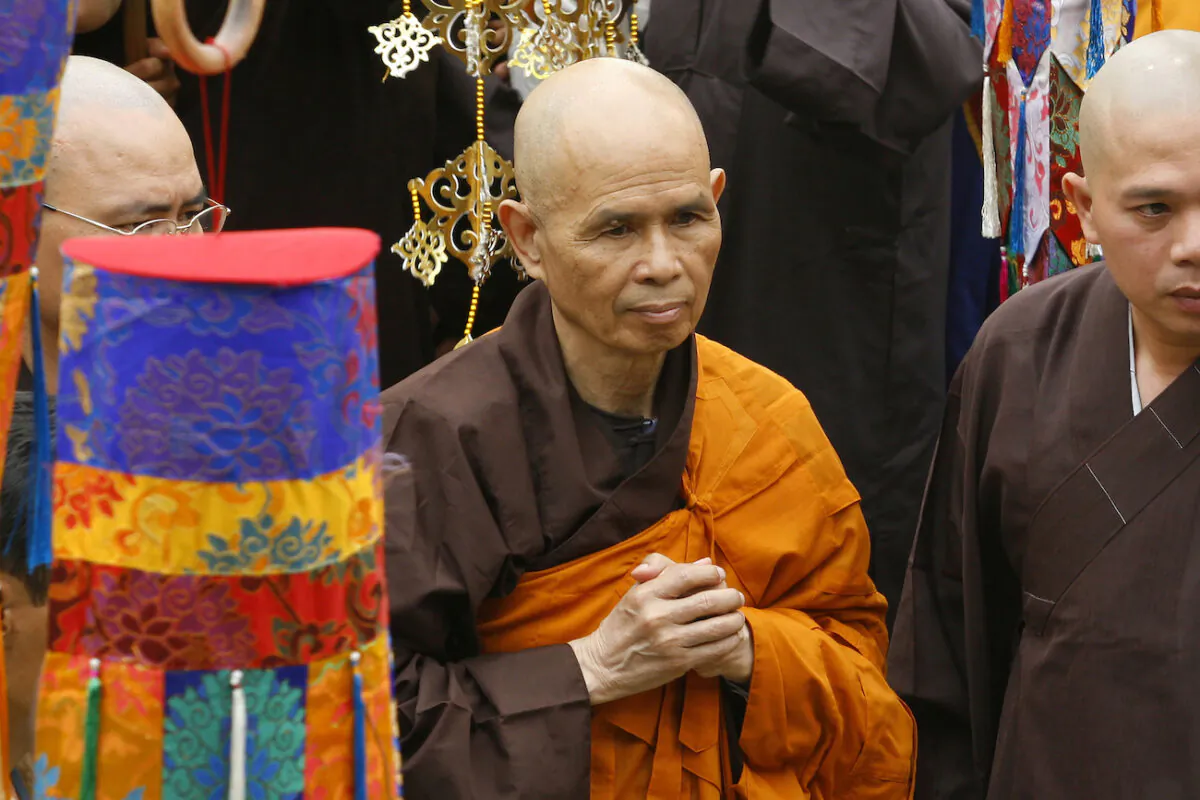 Vietnamese Zen master Thich Nhat Hanh arrives for a Great Chanting Ceremony at Vinh Nghiem Pagoda in Ho Chi Minh City in Vietnam, on March 16, 2007. (AP Photo)
