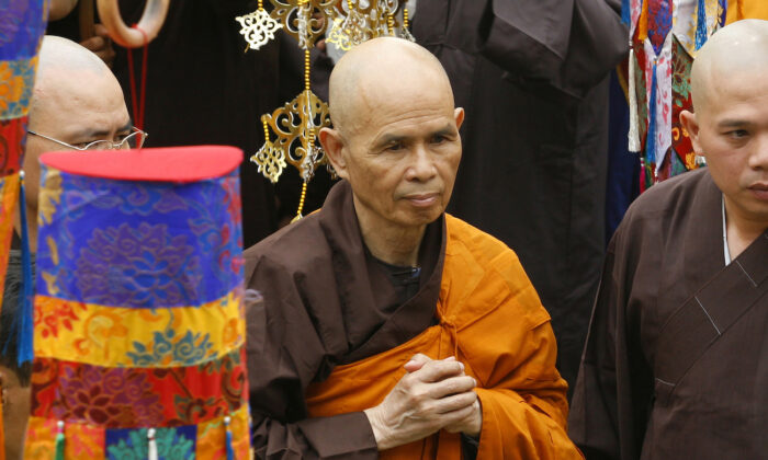 Vietnamese Zen master Thich Nhat Hanh arrives for a Great Chanting Ceremony at Vinh Nghiem Pagoda in Ho Chi Minh City in Vietnam, on March 16, 2007. (AP Photo)