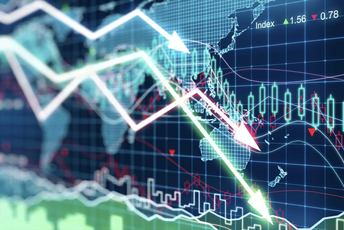 Business graph with arrows tending downwards. (Shutterstock)