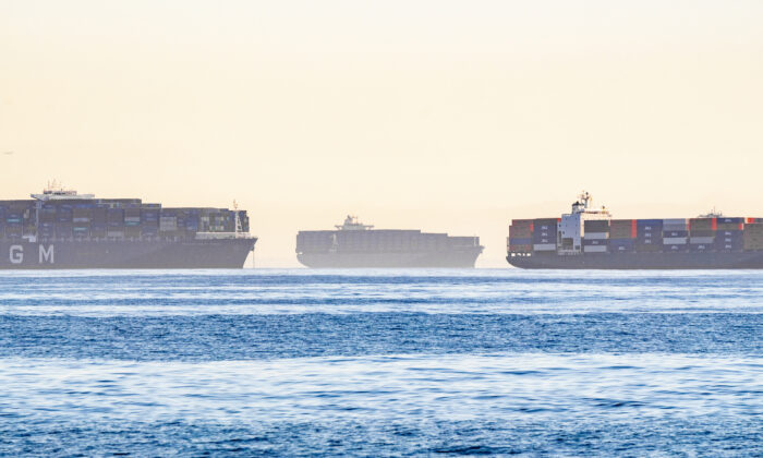 Cargo ships wait outside the ports of Los Angeles and Long Beach on Oct. 27, 2021. (John Fredricks/The Epoch Times)