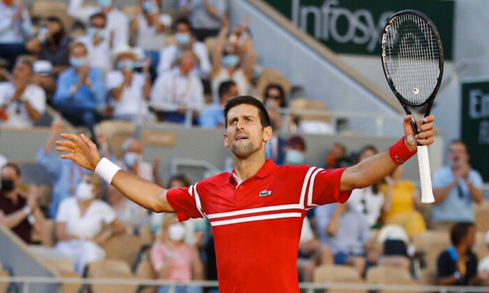 Serbia's Novak Djokovic reacts during the final against Greece's Stefanos Tsitsipas on Day 15 of The Roland Garros 2021 French Open tennis tournament in Paris, France, on June 13, 2021. (Gonzalo Fuentes/Reuters)