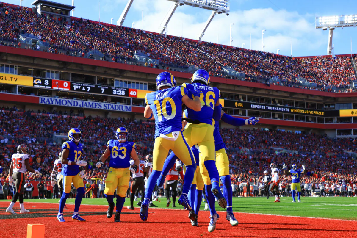 Kendall Blanton #86 of the Los Angeles Rams celebrates with teammates after scoring a touchdown in the first quarter of the game against the Tampa Bay Buccaneers in the NFC Divisional Playoff game at Raymond James Stadium, in Tampa, on Jan. 23, 2022. (Mike Ehrmann/Getty Images)