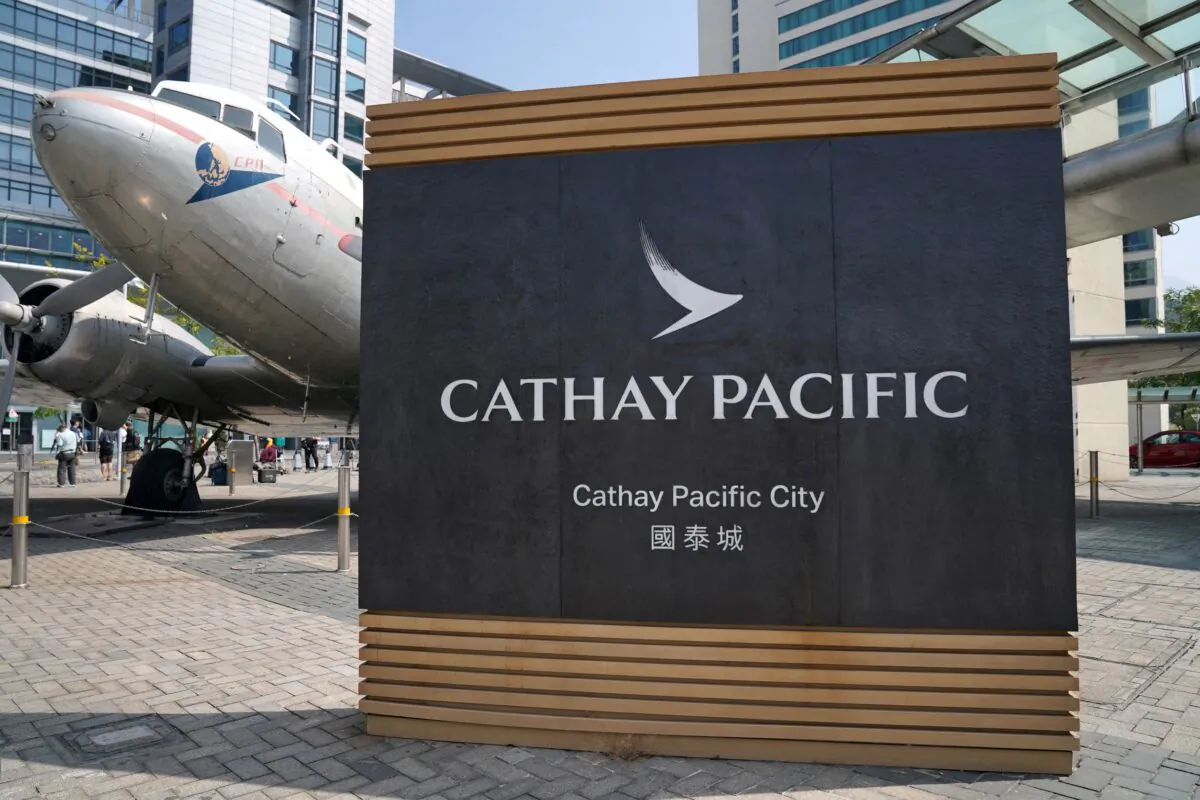A sign of Cathay Pacific is seen at its headquarters Cathay City in Hong Kong, China, on Oct. 21, 2020. (Lam Yik/Reuters)