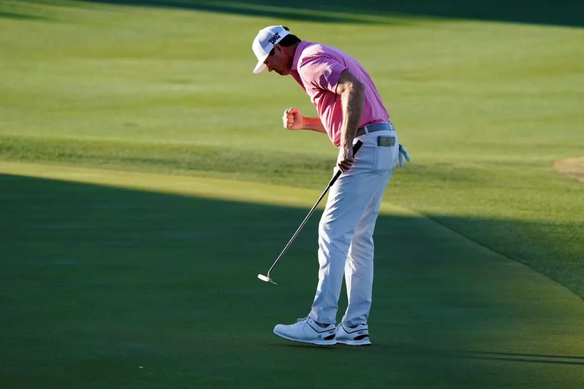 Hudson Swafford pumps his fist after making a putt for par on the 18th hole during the final round of the American Express golf tournament on the Pete Dye Stadium Course at PGA West, Sunday in La Quinta, Calif., on Jan. 23, 2022. (Marcio Jose Sanchez/AP Photo)