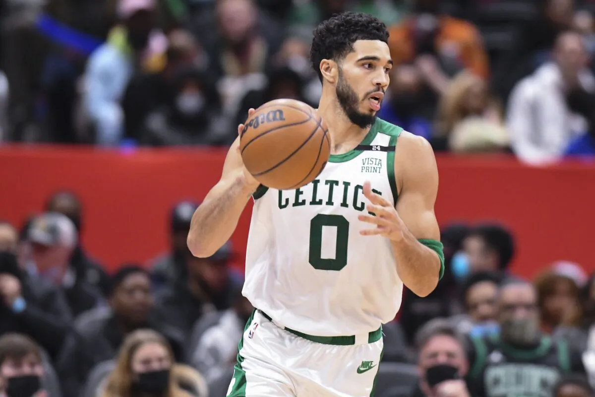 Boston Celtics forward Jayson Tatum (0) dribbles during the first half against the Washington Wizards at Capital One Arena in Washington, on Jan. 23, 2022. (Tommy Gilligan/USA TODAY Sports via Field Level Media)