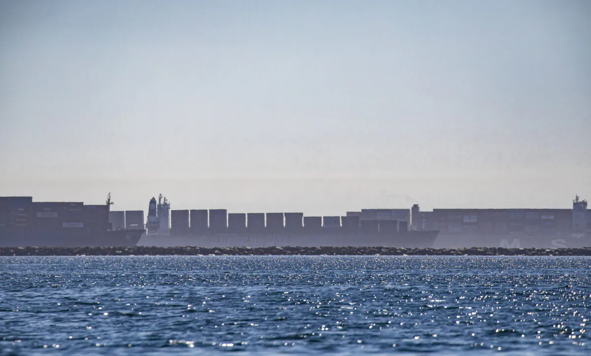 Delays in the transfer of cargo continue in Southern California as vessels line the horizon waiting offload containers into the Ports of Los Angeles and Long Beach, Calif., on Oct. 27, 2021. (John Fredricks/The Epoch Times)