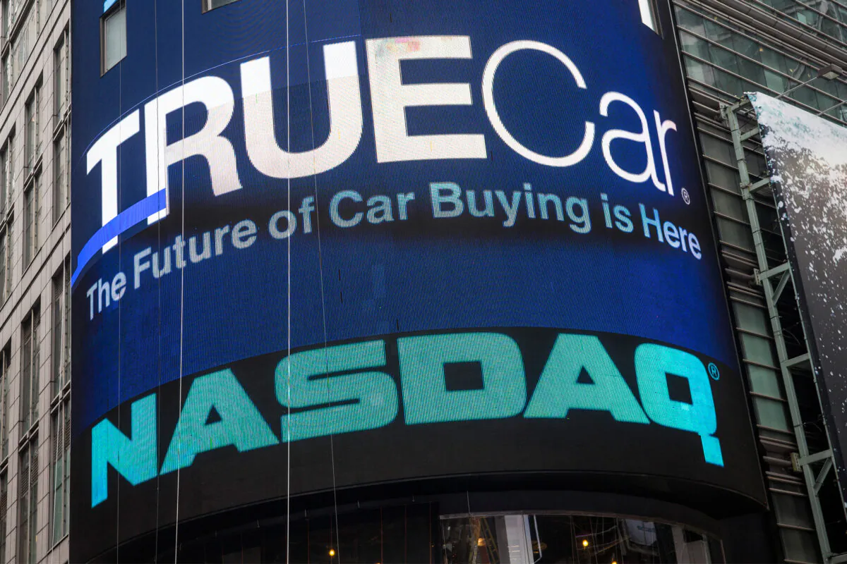 TrueCar's logo is displayed on the Nasdaq billboard in Times Square, New York, on May 16, 2014. (Andrew Burton/Getty Images)